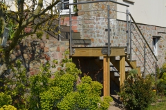 Escalier inox et verre sur terrasse Silvadec - MCO - Créances